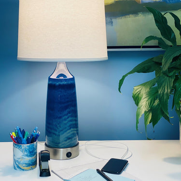 Scatchard 26" Stoneware Table Lamp with USB Base styled in a lived-in room – House of Troy