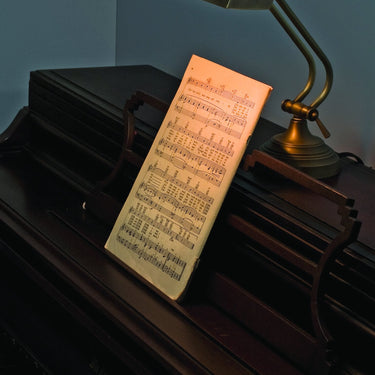 10" Desk & Piano Lamp, Style P10-131 styled in a lived-in room – House of Troy