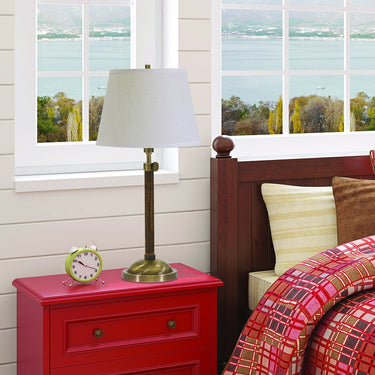 Richmond Adjustable Table Lamp styled in a lived-in room – House of Troy
