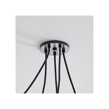 Helium medium chandelier installed in a modern living room interior