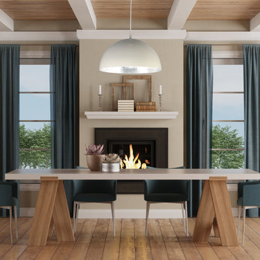 ET2 Hemisphere Gloss White dome pendant over a long wood dining table in front of a fireplace
