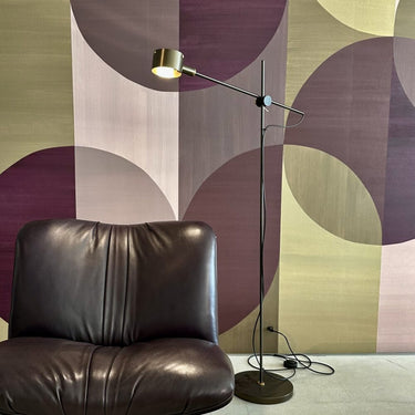 Oluce G.O. adjustable floor lamp with horizontal arm and premium metal finish