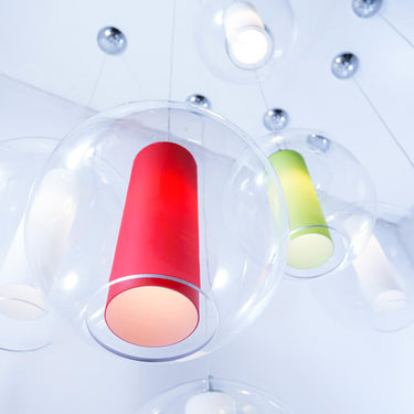 Viso Ilu hand-painted glass pendant installed in an interior, view 1