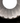 Close-up of Doric 28 LED pendant's unique scalloped interior detail on a rose marble resin shade.