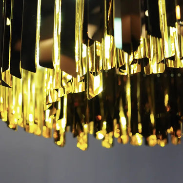 High-End Tom Kirk 24-Inch Chandelier with Polished Faceted Metal Design