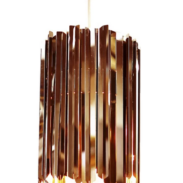 Stainless steel bronze Facet 18 mini pendant by Innermost hanging in a minimalist home office, providing diffused ambient lighting.