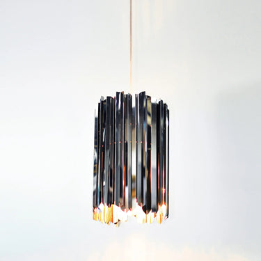 Small modern pendant light, Innermost Facet 18, with mirrored surface appearing like crystal, suitable for kitchen island lighting.