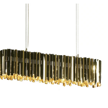 Luxurious Facet pendant light in brass finish, perfect for hotel lobbies.