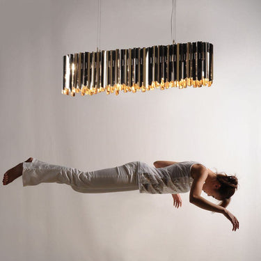 Dimmable bronze ceiling fixture ideal for contemporary dining rooms.
