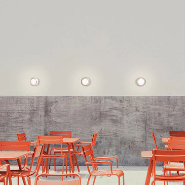 Energy-efficient round flush mount ceiling light with adjustable CCT for smart home residential.