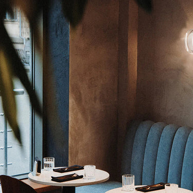 Contemporary square flush mount light in a hotel hallway, ideal for high-traffic commercial spaces.
