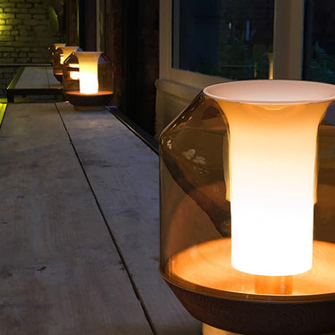 Designer bedside lamp in hand-blown amber glass and ash wood