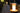 Designer bedside lamp in hand-blown amber glass and ash wood