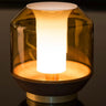 Contemporary table lamp for hotel rooms with warm LED glow