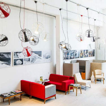 Adjustable LED suspension light for dining rooms and modern interiors installed in stuido