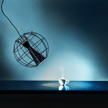 Black directional LED pendant lamp with minimalist wireframe design
