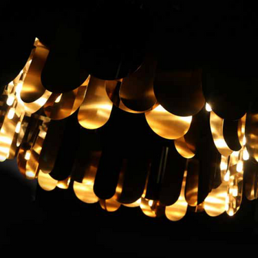 Luxury multi-disc brass chandelier with polished and matte finishes