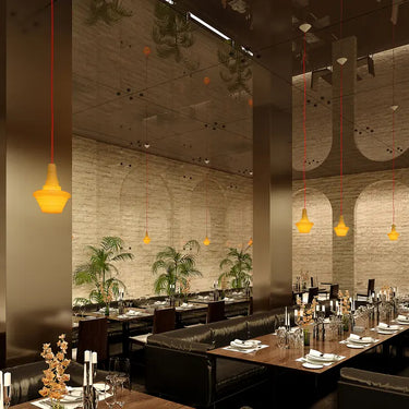 Grouping of Stupa Pendant Lights in various sizes and colors, demonstrating versatile design for commercial spaces.