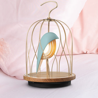 Aqua Blue Jingoo by Daqiconcept glowing beside pale pink linens