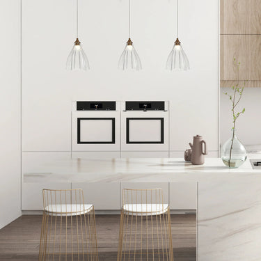 Juanshin Pendant Light Illuminating a Dining Room
