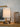 Jynn Cordless Dark Antique Brass Lamp in a living room setting