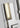 Close-up of Kal Small Sconce in polished nickel finish showing mechanical joints and clean design