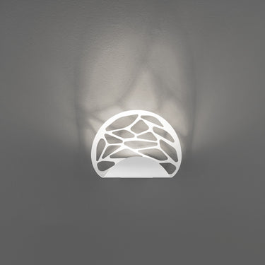 Coppery bronze Kelly LED wall sconce with laser-cut design