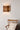 Kerflights S2 wall sconce in Black Walnut mounted on a wall, Graypants lifestyle photograph