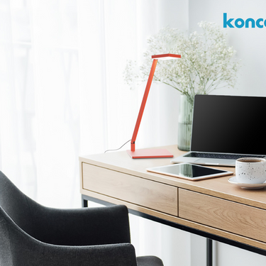 Compact single-arm LED desk lamp with tunable white light and touch dimmer by Koncept Tech