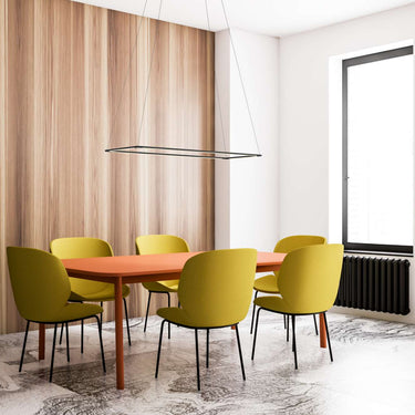 Customizable Koncept Z-Bar modular pendant lighting system with four rotatable bars over a dining room table.