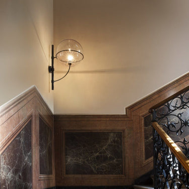 Weather-resistant outdoor wall lamp with opaline globe and chromium-plated metal structure