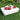 White Crib daybed with red pillows and a tray on a lawn