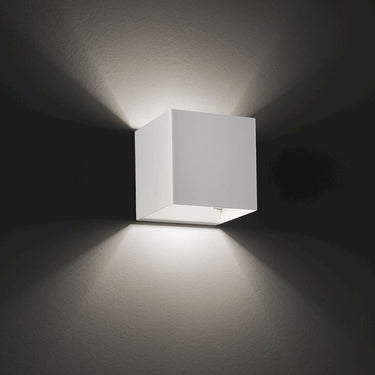 Modern Laser Wall Sconce by Lodes with flush-mounted metal design for residential and commercial interiors