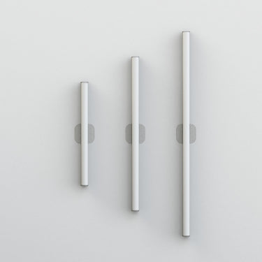 Modern 3ft round LED wall and ceiling light by Artemide, dimmable and ADA-compliant for bedrooms or office spaces