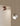 Modern Lodes Spider ceiling light in matte champagne and terra with a focused LED beam