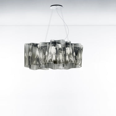 Sculptural Italian linear chandelier for dining area ambiance.