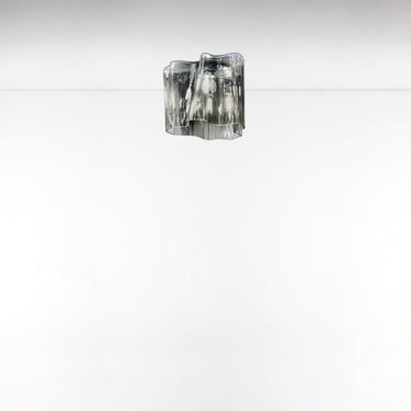 Italian-designed ceiling light by Artemide with satin finish glass diffuser and minimalist style