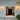 Lyndon outdoor wall lamp by Oluce flanking a front entry, lifestyle view
