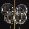 Lyndon pendant light by Oluce with transparent glass globe, studio shot
