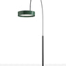 Oluce Berlin-Out arched floor lamp with a green round shade and black stem on a light studio floor