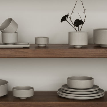 Vase with branch on open shelves | MAKOTO by Carsten Gollnick for blomus