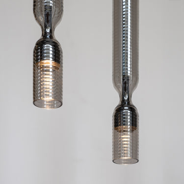 Penta Misty Texture pendant light with a smoked textured borosilicate glass shade