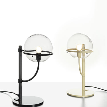 Lyndon 283 outdoor table lamp by Oluce in black and ivory together, studio shot