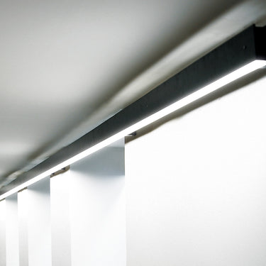 Marc Arm linear LED lamp by David Abad