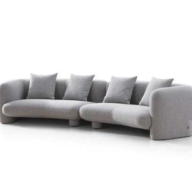 Marin modern curved sofa by Soho Concept in medium grey boucle fabric with deep seating