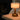 Mini Tito Cordless Table Lamp Dark Antique Brass Pleated Shade on desk