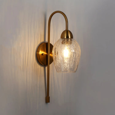 Modern brass wall sconce for living room