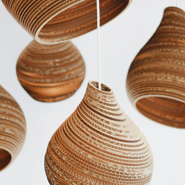 Array of Graypants Scraplights Hive pendants in multiple sizes (9, 12, 15 inch)