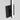 17 inch Kenway designer wall light fixture, installed vertically, showing warm LED glow, matte black finish