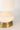 Bella cordless table lamp with ivory ceramic body and brass accents